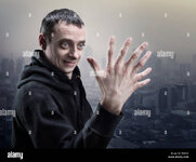 surprised-man-looks-at-his-palm-with-seven-fingers-F63015.jpg